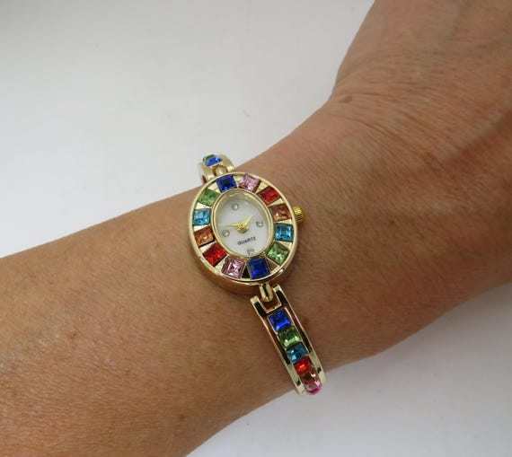 Vintage Harlequin Watch: Gold Plated Bracelet, White Oval Dial AA13