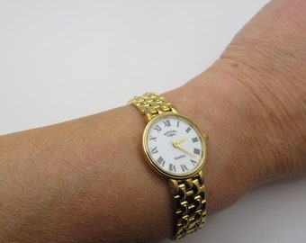 Orologio d'oro rotante vintage / Misura del polso regolabile / orologio da donna vintage anni '90 / orologio svizzero / orologio vintage / orologio da donna (q26)