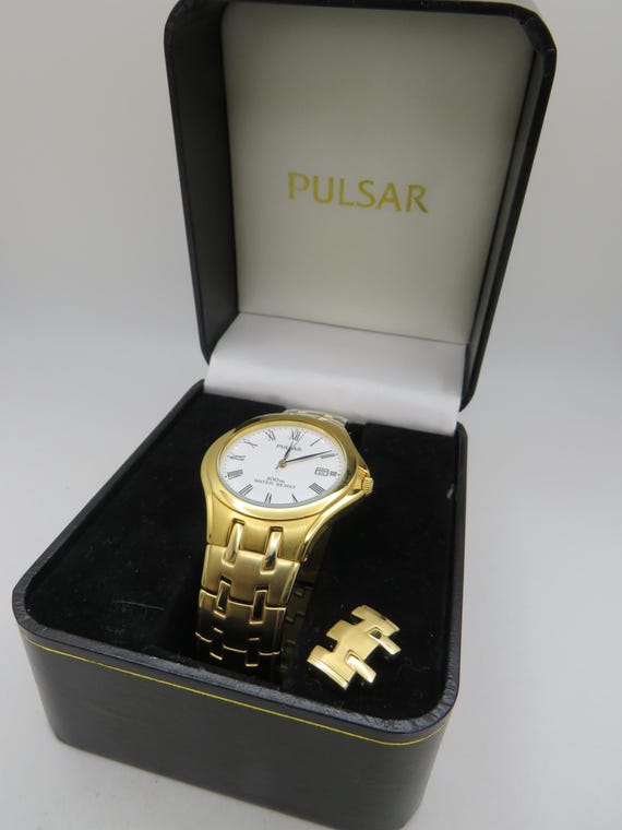 Pulsar by seiko gold sports watch / vintage 100m dive watch / Japan