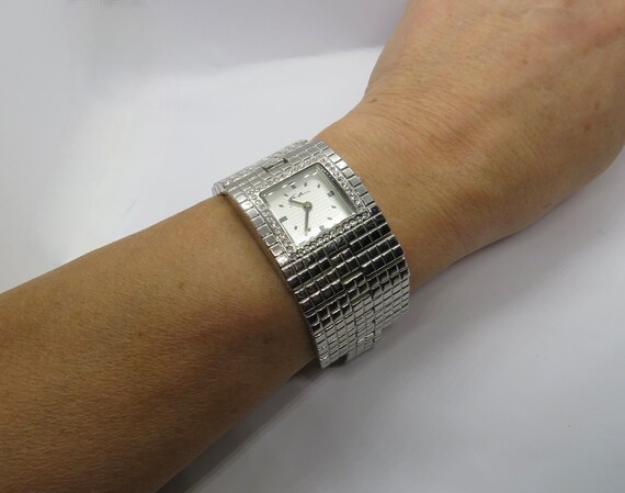 Gold cuff shop watch