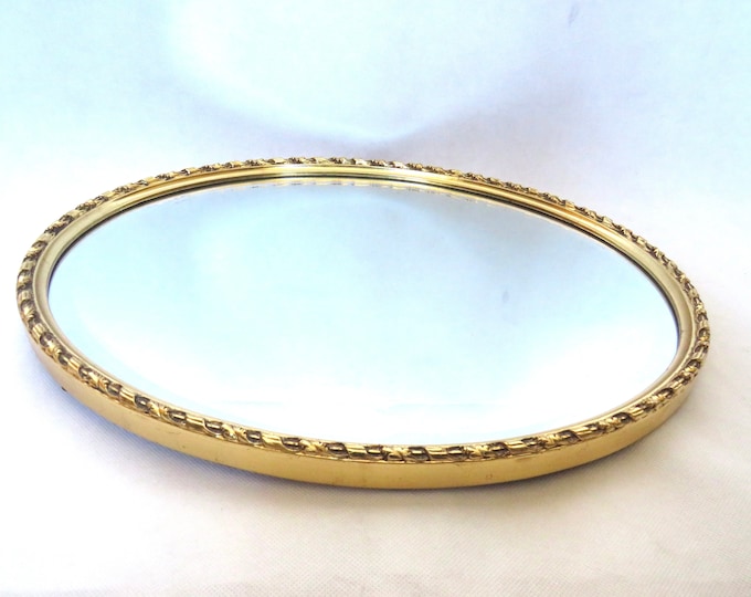 Vintage oval Wall Mirror Guilt  / Made in England / with Gold painted Frame