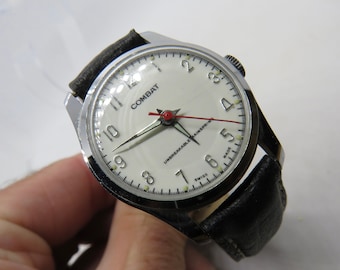 vintage horloge / verzamelhorloge / vintage veldhorloge / mechanische horloges /Vintage Combat Unbreakable Mainspring Swiss Made (RA11)