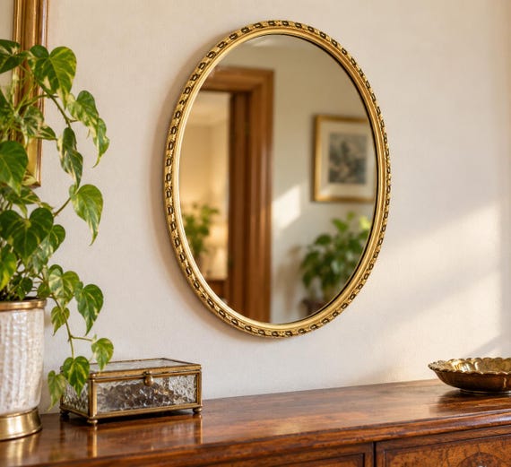 Vintage oval Wall Mirror Guilt  / Made in England / with Gold painted Frame