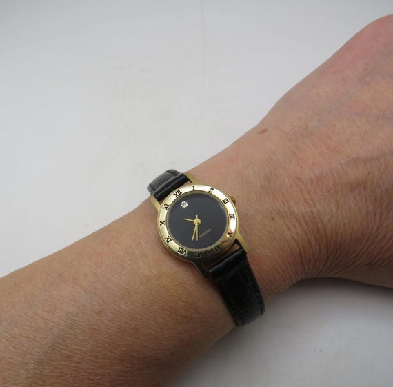 Vintage diamond watch, Gold plate Finish, black dial Leather Strap (p23)