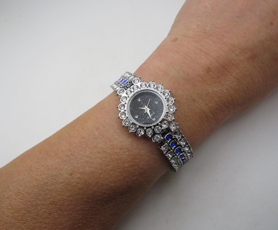 Blue Diamond Ladies Watch: Black Star Dial, Steel Bracelet BB3