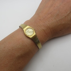Pulsar dainty watch / vintage pulsar by seiko wrist watch / womans gold watch / fits wrist 7&quot; / vintage   / watch / ladies watch (x30)