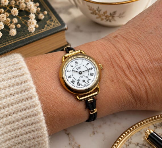 Vintage Ladies Watch: working Sub dial Dial, Rolled Gold. Black  Strap, Japan Quartz (e28)