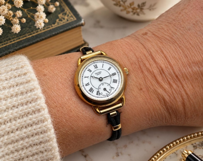 Vintage Ladies Watch: working Sub dial Dial, Rolled Gold. Black  Strap, Japan Quartz (e28)