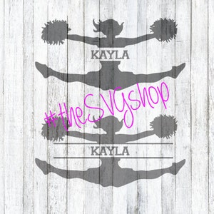 May include: A gray silhouette of a cheerleader in a split, holding pom-poms, with the name "KAYLA" above and below. The text "#theSVGshop" is in pink. The background is a white wood grain.