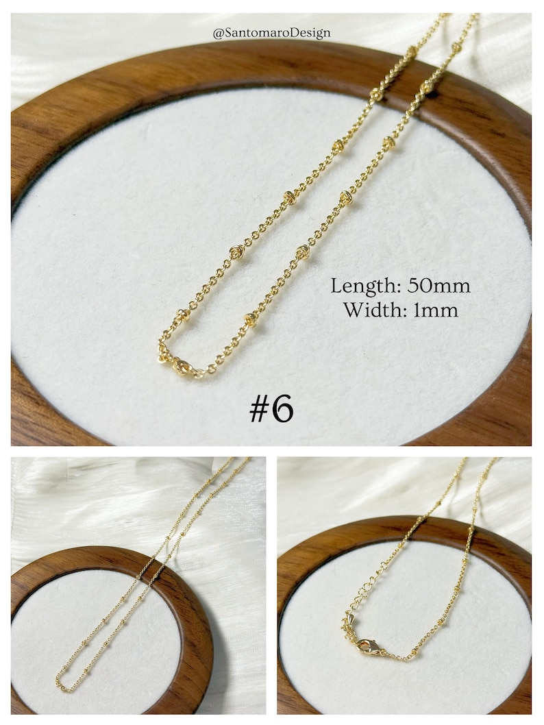 Op de afbeelding: Een delicate goudkleurige ketting met kleine, gelijkmatig verdeelde kralen. De ketting is 50 mm lang en 1 mm breed. De afbeelding bevat de tekst "#6" en de tekst "Lengte: 50 mm Breedte: 1 mm". De ketting wordt op een wit oppervlak getoond.