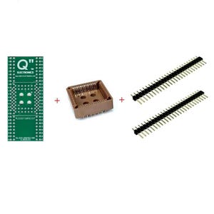 May include: A green circuit board with a brown plastic chip socket and two sets of gold-colored pin headers. The circuit board has the text "Q"" Electronics" and "PLCC27-DIP32 0.5" printed on it.