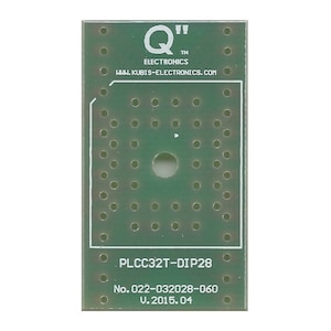 May include: Green circuit board with a white label that reads "PLCC32T-DIP28", "No. 022-032028-060", and "V. 2015.04". The board has a large circle in the center and many smaller circles around it.