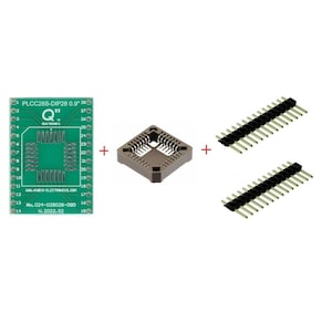 May include: An electronics kit featuring a green PLCC28S-DIP28 circuit board, a square socket, and two rows of black and silver pins. The board has text that reads "Q" and "ELECTRONICS". The kit is designed for electronic components.
