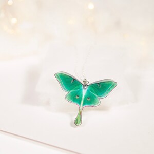 Handcrafted Green Lunar Moth Pendant on a delicate silver chain - Eco-friendly nature-inspired jewelry for fashion-conscious women
