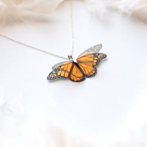 pendant necklace with monarch butterfly