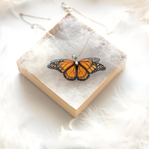 bright orange butterfly pendant