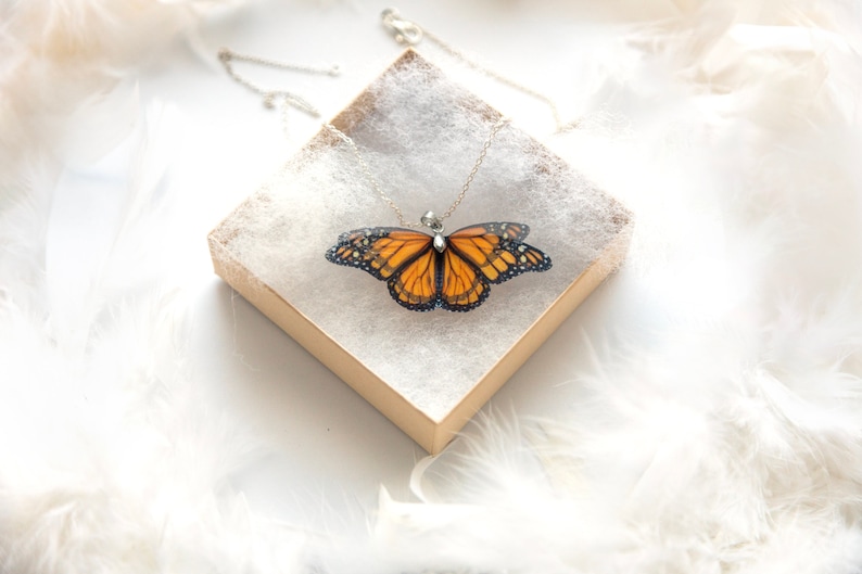 bright orange butterfly pendant