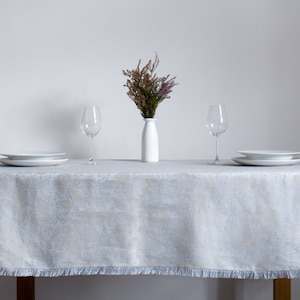 Light Linen Tablecloth with an Elegant Pattern and Fringes