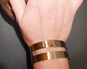 Saturn cuff bracelet.