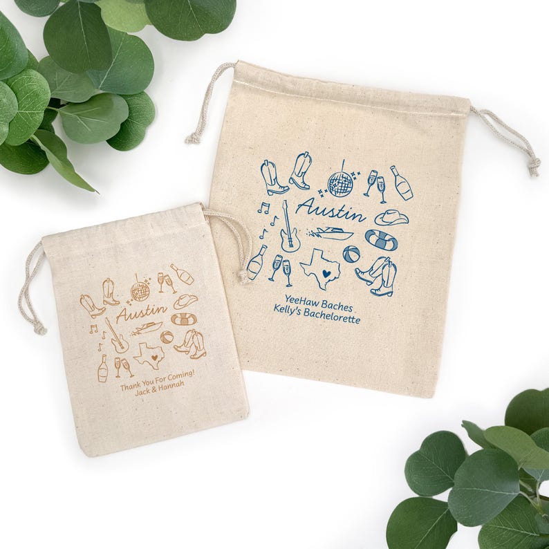 5" x 7" cotton drawstring bags printed with hand drawn Austin icons including cowboy boots, disco ball, boat, and a guitar along with two lines of personalized text.
