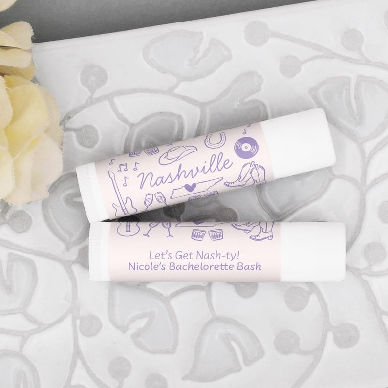 Personalized lip balm is used as gifts for your destination bachelorette party or wedding.  We drew fun doodles of Nashville and the design includes two lines of custom text.