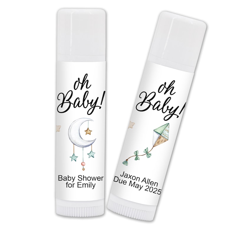 May include: Two white lip balm tubes with labels. One features a crescent moon and stars, the text "oh Baby!" and "Baby Shower for Emily." The other has a kite design, the text "oh Baby!" and "Jaxon Allen Due May 2025."