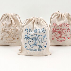 Natural color cotton bags with drawstring top with a Las Vegas doodle design representing a disco ball, playing cards, Vegas sign, pool floats, and other pool related icons.  Includes two lines of custom text.