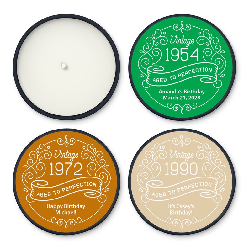 May include: A candle with a black rim and a white wax interior is shown next to three round labels. The labels have a vintage design with the years 1954, 1972, and 1990, along with birthday messages.