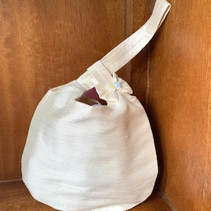 Cream Satin Japanese Knot Wristlet Bag: Mother of Pearl Hearts, Bridal Evening Bag.