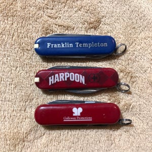 Set of Three Small Victorinox Swiss Army Advertising Knives
