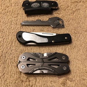 Set of Four Small Pocket Knives and Pocket Tools
