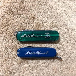 Pair of Wenger & Victorinox Eddie Bauer Edition Pocket Knives