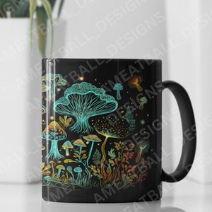 May include: Black ceramic mug with a colorful illustration of mushrooms and plants. The design features a variety of mushrooms in shades of blue, green, and yellow, with intricate details.