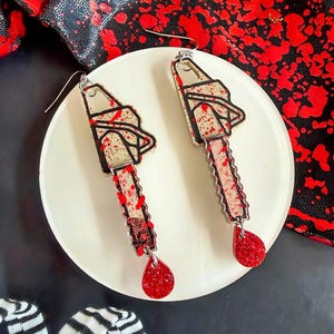 Chainsaw Earrings - Etsy