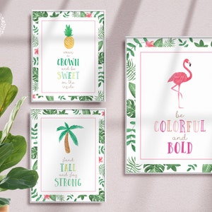 May include: Three printable wall art prints with tropical themes. The first print features a pineapple with the text "wear a crown and be sweet on the inside". The second print features a pink flamingo with the text "be colorful and bold". The third print features a palm tree with the text "stand tall and stay strong".