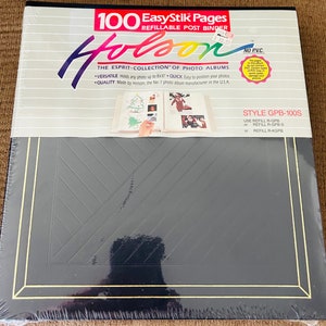 May include: A black photo album with a gold border and the text "100 Easy Stik Pages Refillable Post Binder" and "Holson" on the front cover. The album is made by Holson, the No. 1 photo album manufacturer in the USA. The album is designed to hold photos up to 8x10 inches. The album is made of PVC-free materials. The album is style GPB-100S.