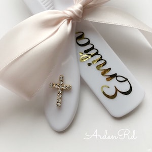 Custom children’s hairbrush and comb set with crystal cross. Can be made in many colors. (Pink and gold shown here)