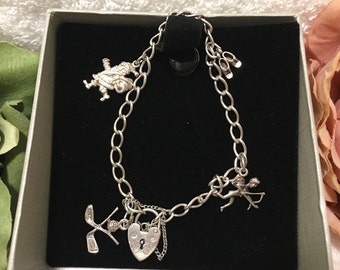 Lovely Elegant Vintage SOLID Sterling Silver CHARM Bracelet-4 Different Charms-Beautifully Designed-Stamped for Sterling-Weighs 10.95 grams
