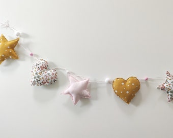 Garland stars and hearts baby room decoration
