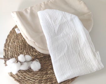 Topponcino Montessori and its white organic cotton double gauze cover