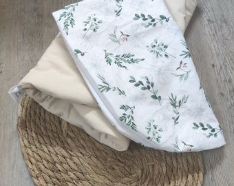 Topponcino Montessori and its nature-themed organic cotton cover