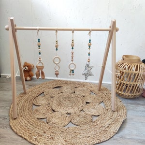 Montessori wooden activity arch for babies + set of 4 liberty suspensions