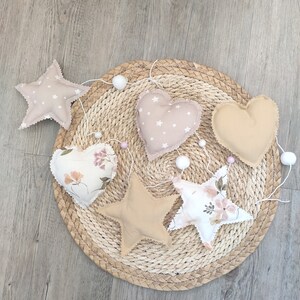 Sterngirlande Dekoration Babyzimmer Thema große Blumen
