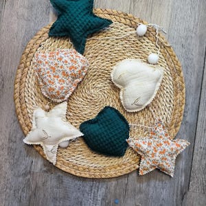 Sterngirlande Dekoration Babyzimmer Thema orange Blumen