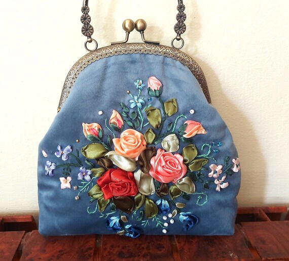 Blaue Tasche mit Samtbeutel mit