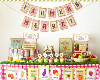 May include: A Farmers Market themed birthday party table setting with a red and white checkered tablecloth. The table is decorated with food, cupcakes, and signs with various vegetables and fruits. The signs have the names of the produce printed on them, such as tomatoes, carrots, radish, eggplant, peppers, sunflower, pumpkin, and strawberry.
