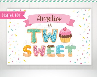 May include: A printable birthday backdrop with a white background and colorful sprinkles. The text "Amelia is Two Sweet" is written in a colorful font with a cupcake graphic.
