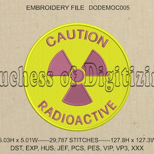 May include: A yellow circle with a pink radiation symbol and the text "CAUTION RADIOACTIVE" inside. The text "Duchess of Digitizing" is below the circle. The image also includes the text "5.03H x 5.01W----29,787 STITCHES----127.8H x 127.3W DST, EXP, HUS, JEF, PCS, PES, VIP, VP3, XXX".