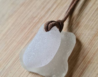 Genuine English Sea Glass pendant necklace, on real leather cord, in solid very pale lilac/lavender. Naturally surf tumbled. Beach glass.