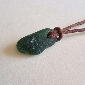 Genuine English seaham  Sea Glass pendant necklace, on real leather cord, in solid green. Naturally surf tumbled. Beach glass.